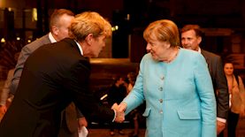 אנגלה מרקל ובן ינובר, צילום: גיא יחיאלי